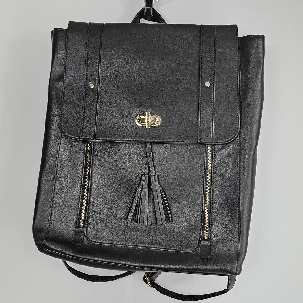Faux leather black backpack with a tassel